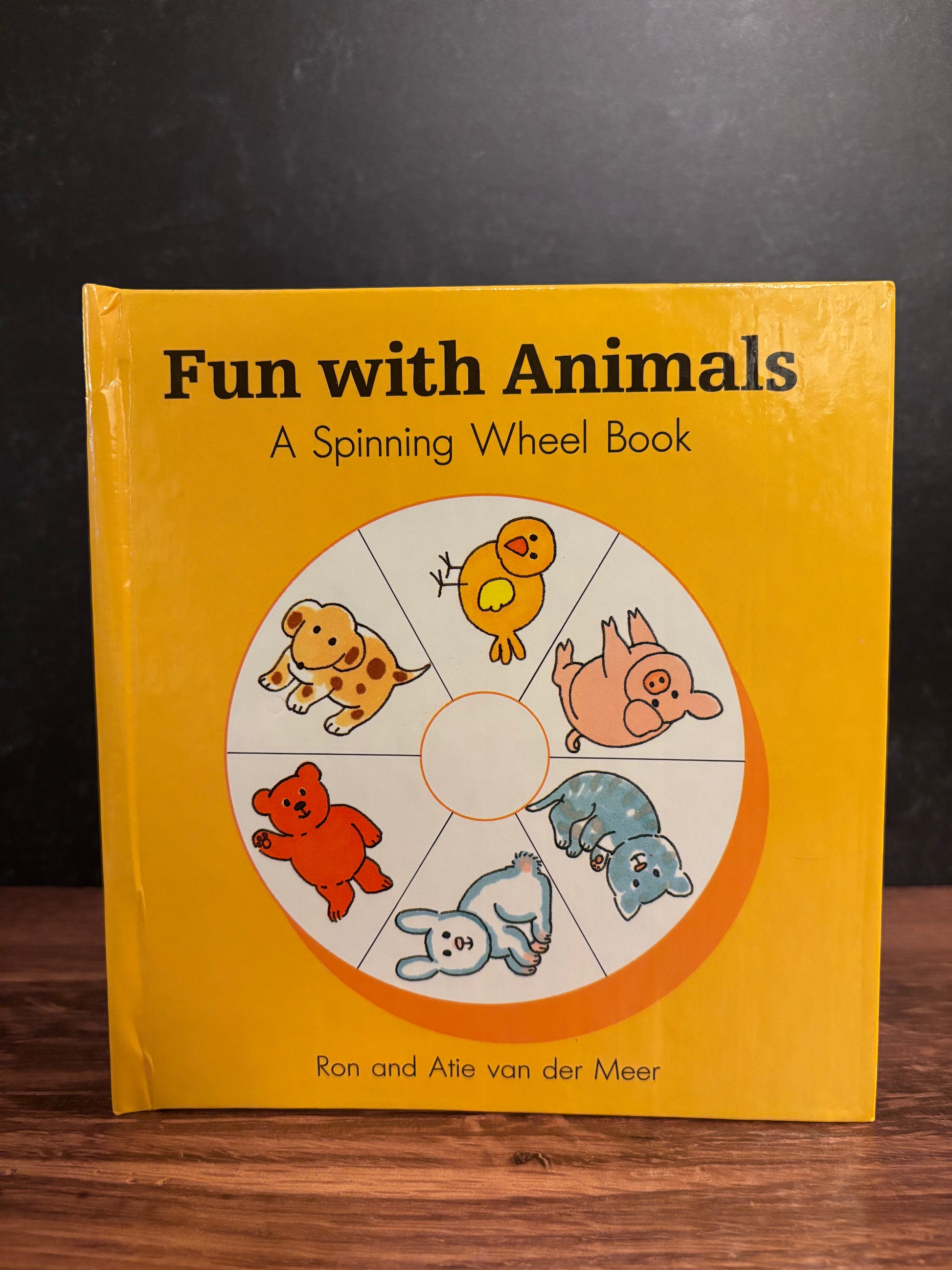 "Fun With Animals: A Spinning Wheel Book" by Ron and Atie van der Meer (Preowned Boardbook)