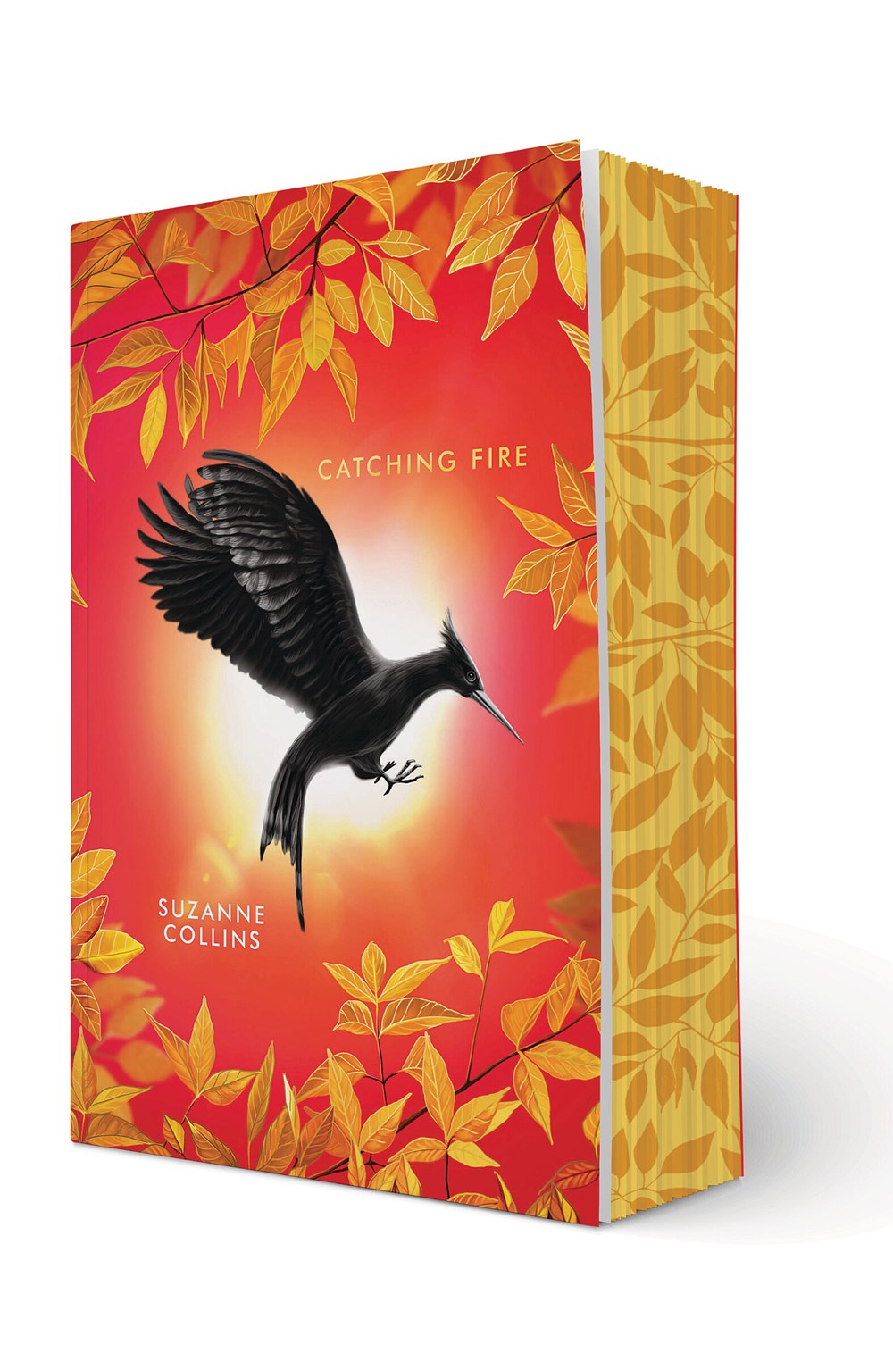 "Catching Fire" by Suzanne Collines (Deluxe Paperback Edition)